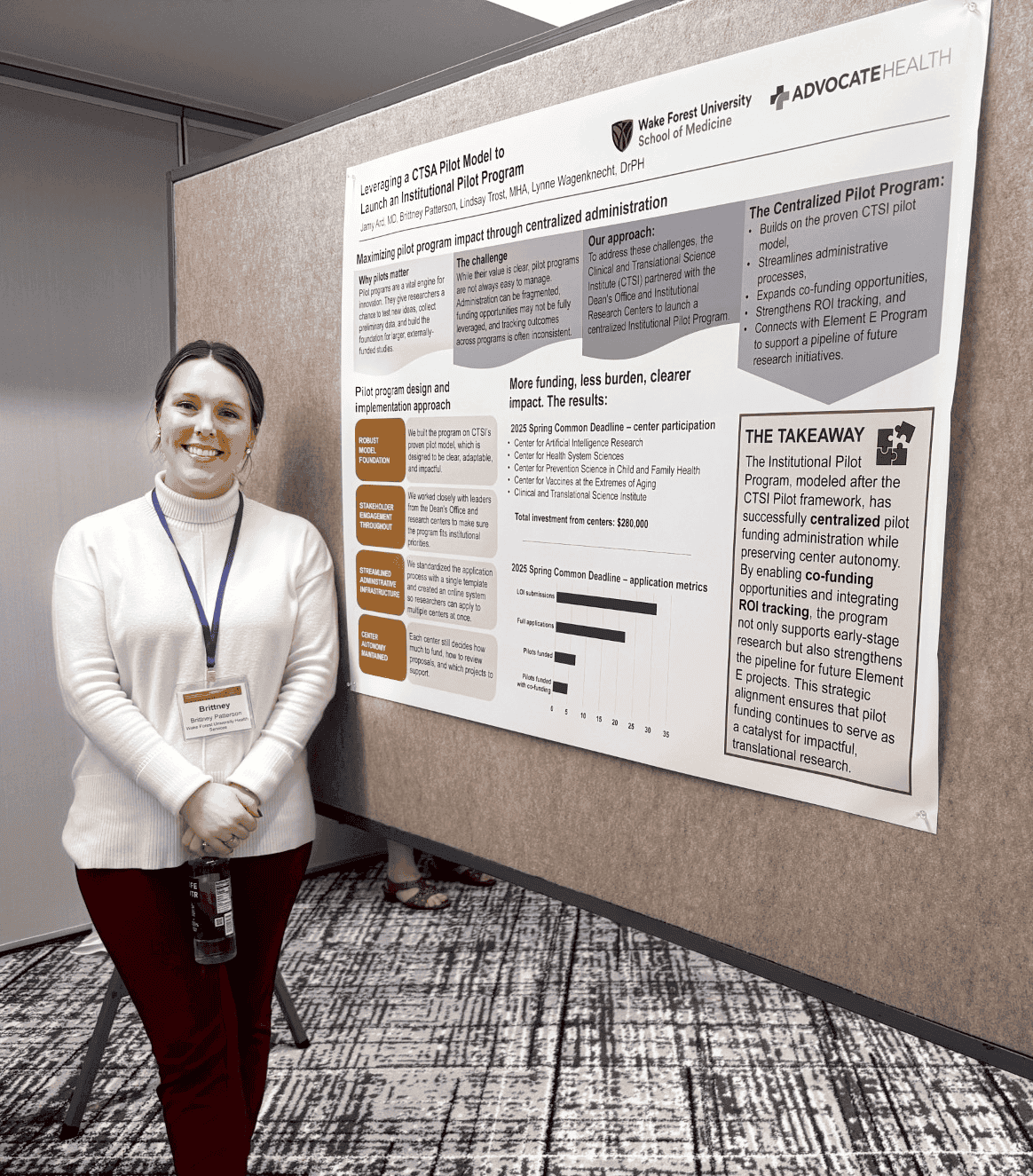 Photo of Brittney Patterson, BBA in front of the Wake Forest CTSI Poster