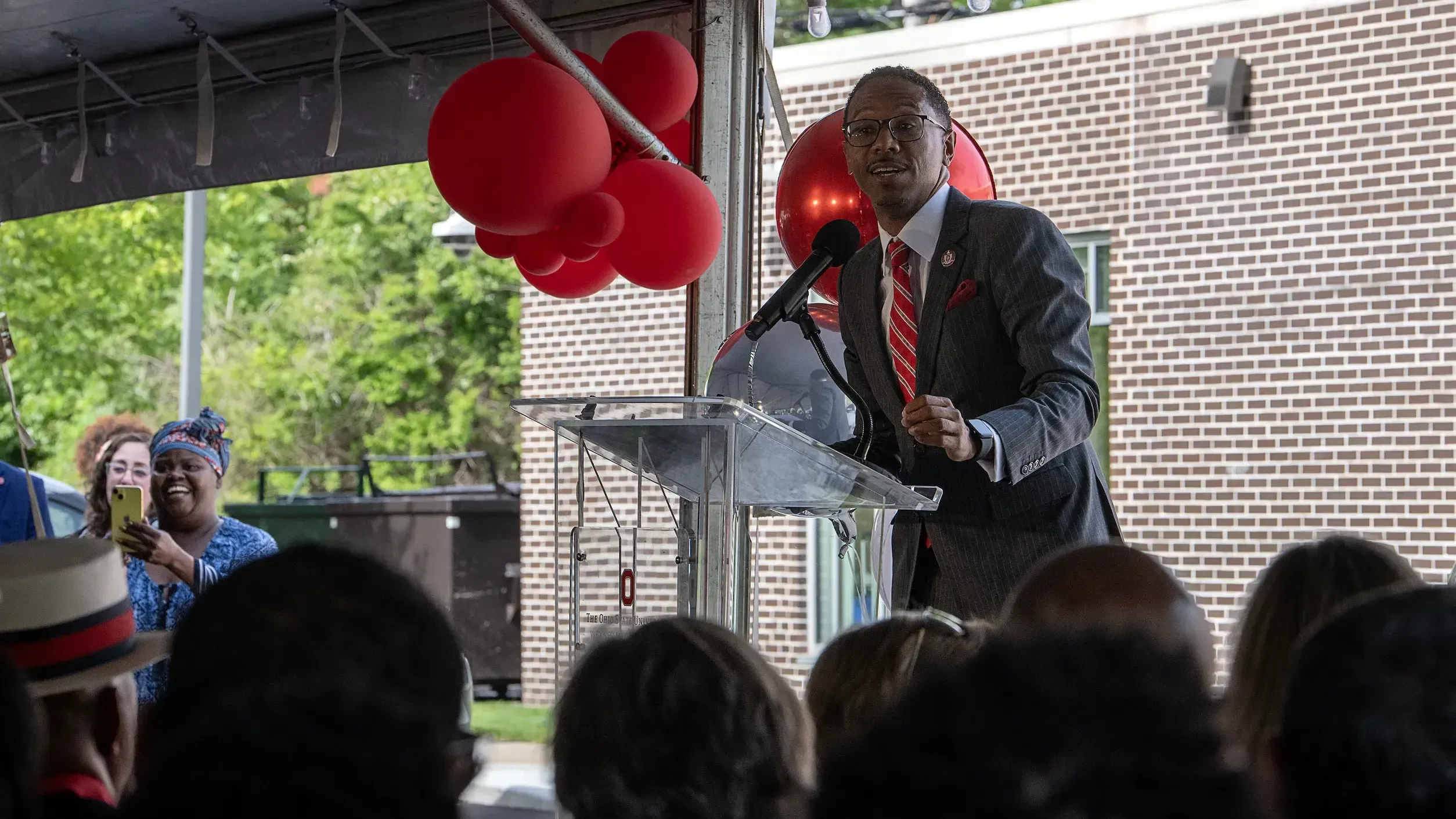 Dr. Joseph speaking at an event.